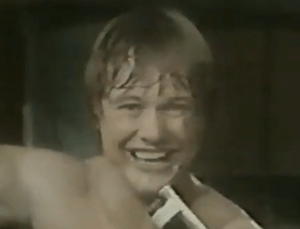 A grinning Roddy Piper speaks into the microphone during the April 7, 1979 episode of Portland Wrestling.